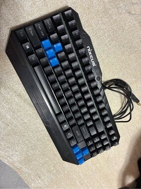 Moda Mechanical Keyboard in Black with Orange Inspection Sticker